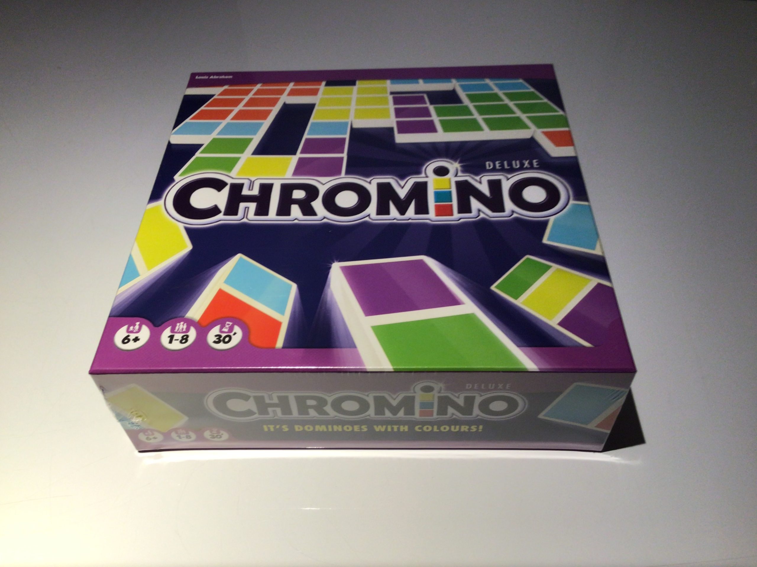 CHROMINO DELUXE. Jouez en famille au dominos de couleur.